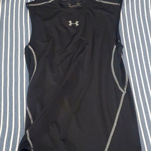 Black sleeveless Under Armour heat gear compression shirt. Size large